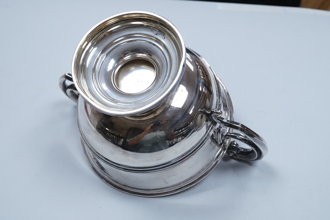 An Edwardian silver two handled presentation pedestal bowl by James Dixon & Sons, Sheffield, 1907, with engraved inscription, diameter 14.8cm excluding the handles, 14.3oz.